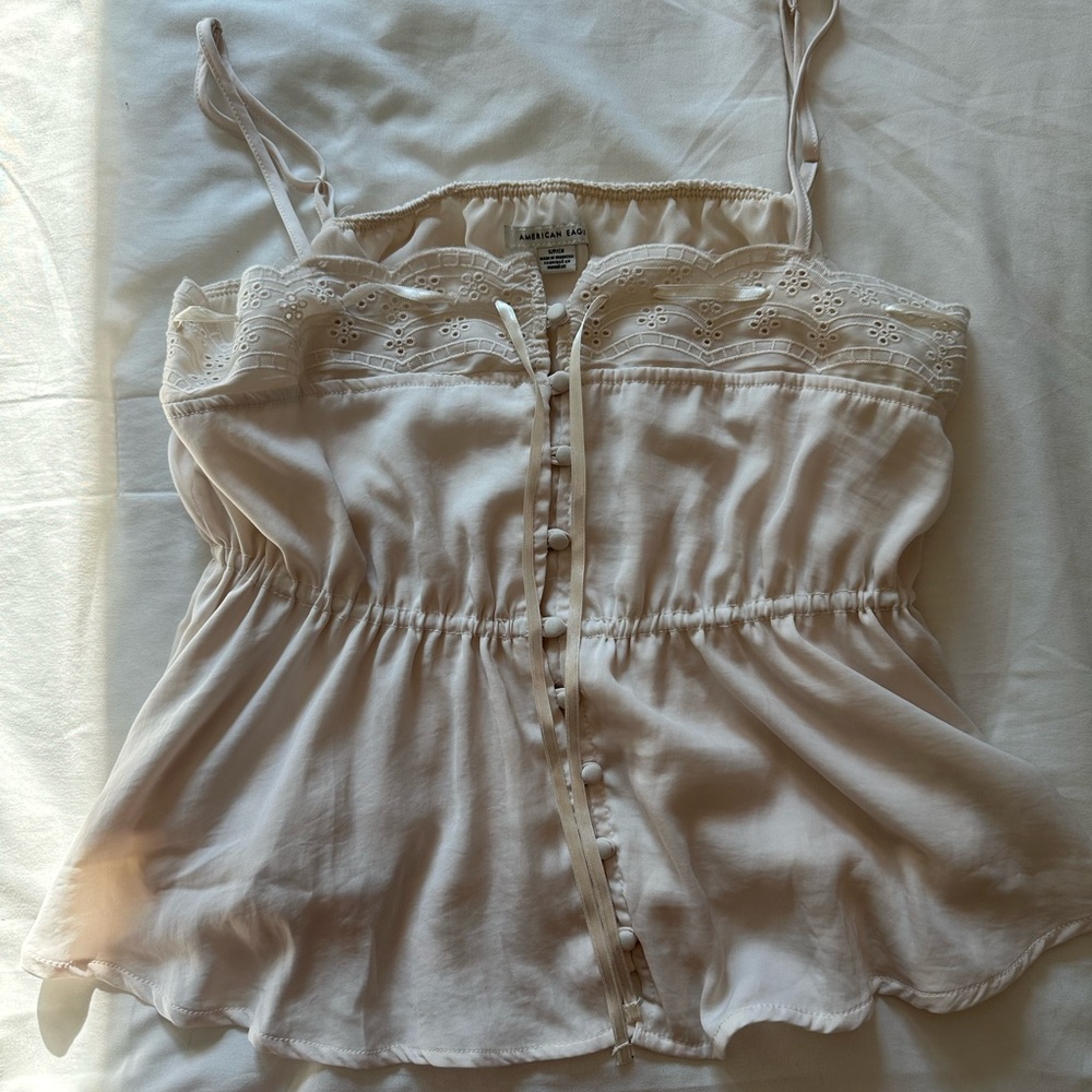 American eagle top. Size small. Color-off white.